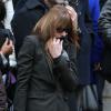 Carla Bruni sortant des obsèques de Kate Barry en l'église Saint-Roch à Paris, le 19 décembre 2013.