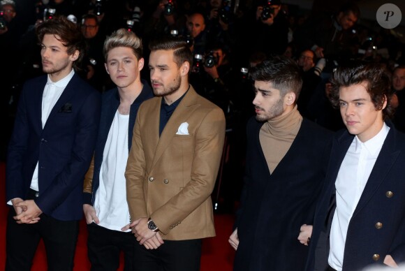 Louis Tomlinson, Niall Horan, Liam Payne, Zayn Malik, Harry Styles des One Direction à la 15e édition des NRJ Music Awards à Cannes. Le 14 decembre 2013.