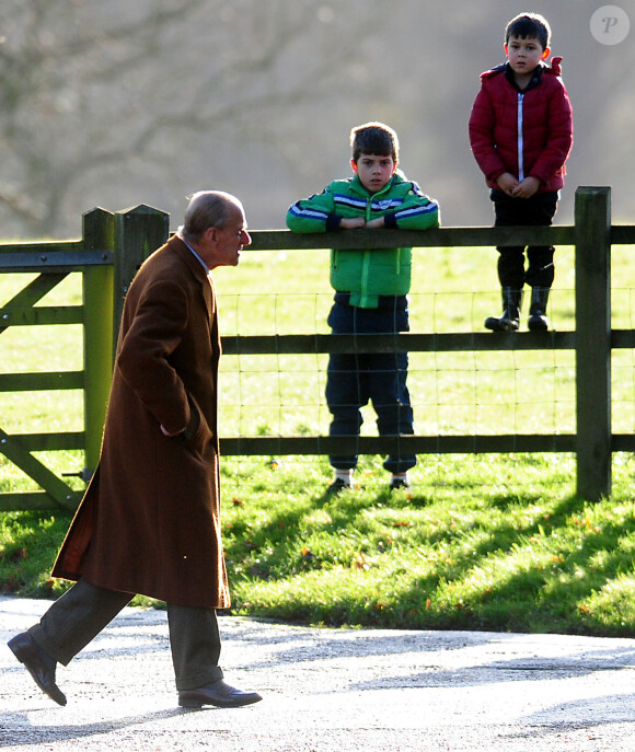 Le duc d'Edimbourg à Sandringham pour la messe le 22 décembre 2013