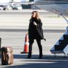 Kim Kardashian au départ de l'aéroport de Van Nuys à Los Angeles, embarque dans un jet privé avec sa famille. Le 27 décembre 2013.