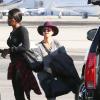 Kourtney Kardashian et sa famille montent à bord d'un jet privé à l'aéroport de Van Nuys. Los Angeles, le 27 décembre 2013.