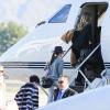 Les Kardashian, Kim en tête, montent à bord d'un jet privé à l'aéroport de Van Nuys. Los Angeles, le 27 décembre 2013.