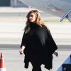 Kim Kardashian au départ de l'aéroport de Van Nuys à Los Angeles, embarque dans un jet privé avec sa famille. Le 27 décembre 2013.