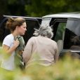  23 - Kate Middleton, avec le prince George et la nounou Jessica Webb, faisant une halte dans un Mc Donald's le 9 septembre 2013 