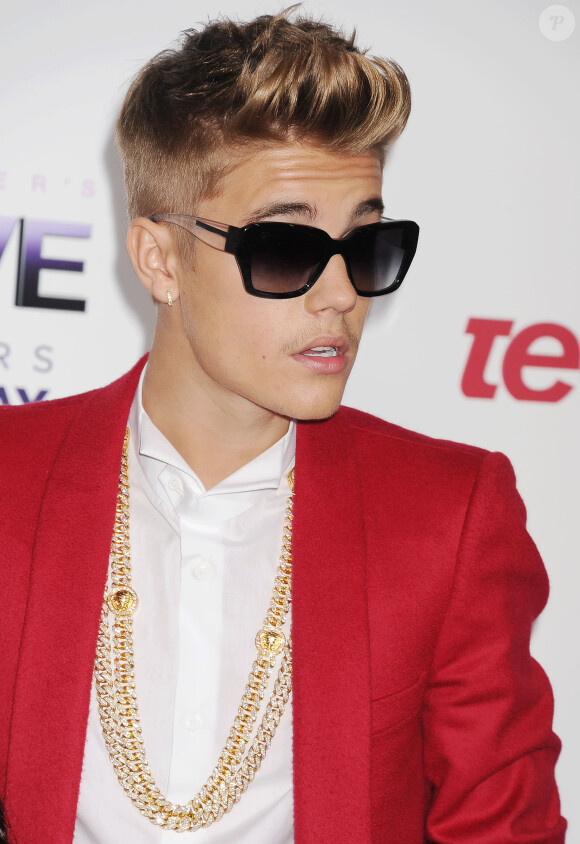 Justin Bieber à la première du film "Justin Bieber's Believe" au Regal Cinemas L.A. Live à Los Angeles le 18 décembre 2013.