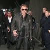 Johnny Hallyday à l'aéroport de Roissy-Charles de Gaulle pour prendre un avion direction Los Angeles, le 12 janvier 2014.