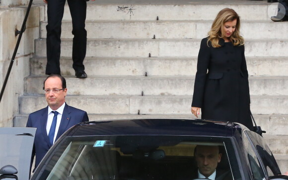 François Hollande et Valérie Trierweiler lors des obsèques de Patrice Chereau en l'église Saint-Sulpice de Paris, le 16 octobre 2013