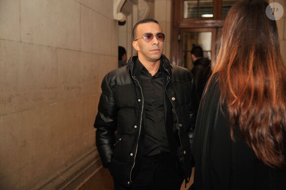 Abousofiane Moustaid, aka Abou, lors de l'ouverture de son procès pour proxénétisme aggravé dans l'Affaire Zahia, le 20 janvier 2014 devant la 16e chambre correctionnelle du Palais de Justice de Paris
