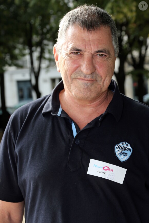 Jean-Marie Bigard - Tournoi de pétanque organisé par Meghanora au profit de la recherche médicale pédiatrique sur la Place des Invalides à Paris, le 29 septembre 2013.