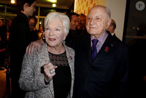 Line Renaud et Pierre Bergé lors du Dîner de la mode pour le Sidaction au Pavillon d'Armenonville à Paris, le 23 janvier 2014