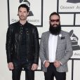 Sebu Simonian et Ryan Merchant du groupe Capital Cities arrivent au Staples Center pour la 56e édition des Grammy Awards. Los Angeles, le 26 janvier 2014.