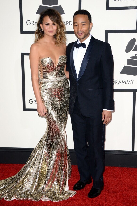 Christine Teigen et John Legend arrivent au Staples Center pour la 56e édition des Grammy Awards. Los Angeles, le 26 janvier 2014.