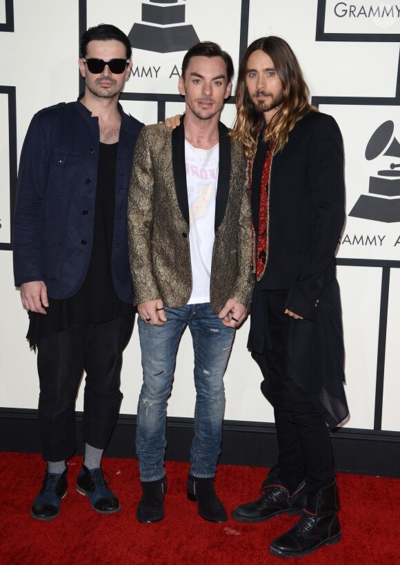 Tomo Miličević, Shannon et Jared Leto du groupe 30 Seconds to Mars, arrivent au Staples Center pour la 56e édition des Grammy Awards. Los Angeles, le 26 janvier 2014.