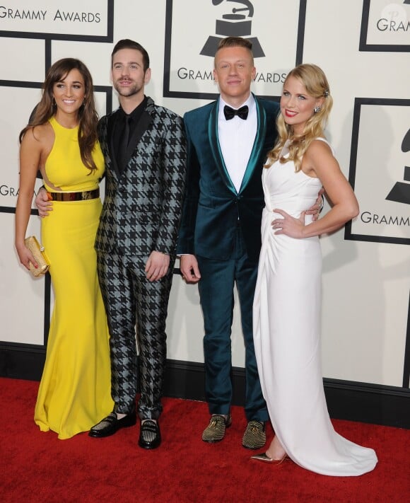 Jackie Ginger, Ryan Lewis, Macklemore et Tricia Davis arrivent au Staples Center pour la 56e édition des Grammy Awards. Los Angeles, le 26 janvier 2014.
