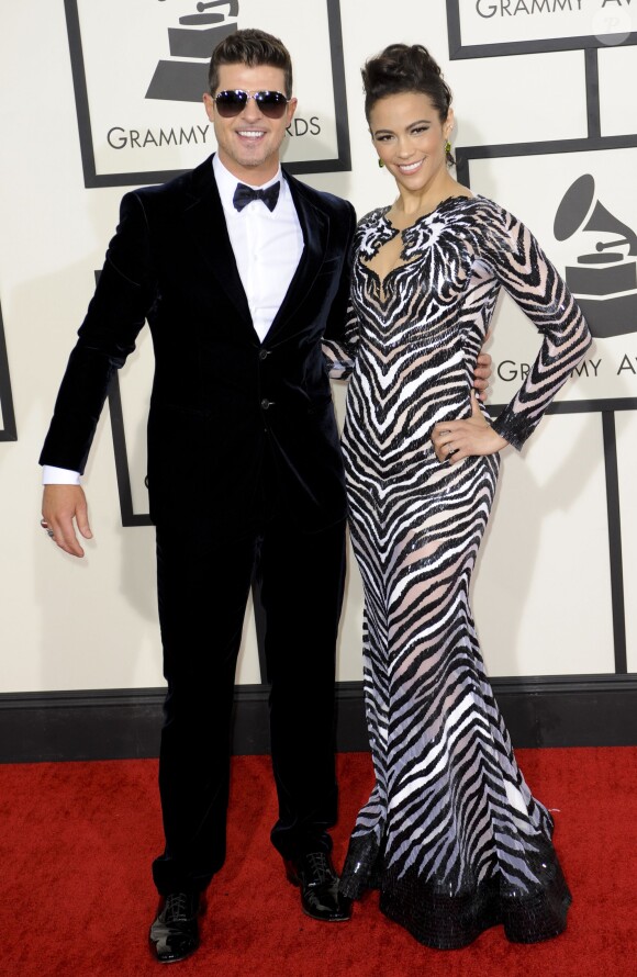 Robin Thicke et sa femme Paula Patton arrivent au Staples Center pour la 56e édition des Grammy Awards. Los Angeles, le 26 janvier 2014.