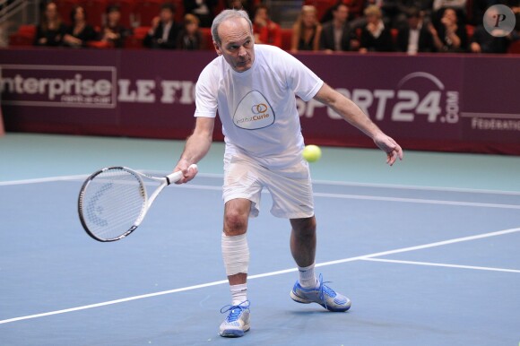 Laurent Baffie à l'occasion d'un match caritatif en marge du 22e Open de tennis GDF SUEZ au Stade Pierre de Coubertin à Paris le 28 Janvier 2014.