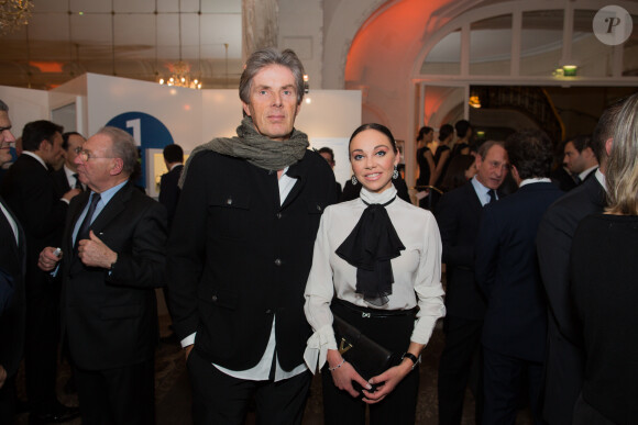 Dominique Desseigne et sa compagne lors du dîner de gala de la Fondation PSG, le 28 janvier 2014, au Pré Catelan à Paris