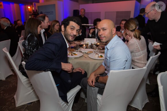 Eric et Ramzy lors du dîner de Gala de la Fondation PSG au Pré Catelan à Paris le 28 janvier 2014