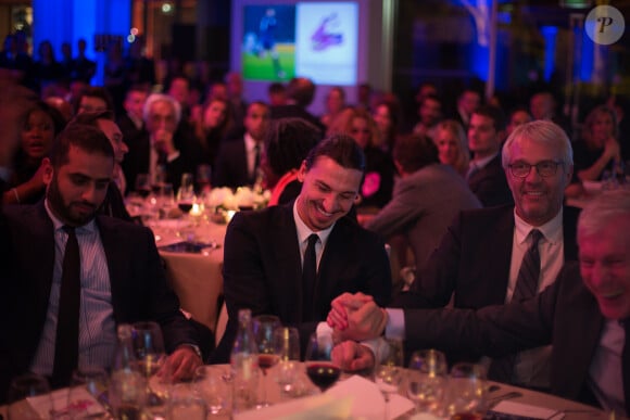 Zlatan Ibrahimovic, Jacques Monclar et Luis Fernandez lors du dîner de Gala de la Fondation PSG au Pré Catelan à Paris le 28 janvier 2014