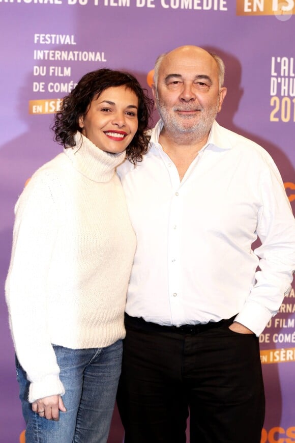Gérard Jugnot et sa compagne Saïda Jawad lors du 17eme Festival international du film de comédie de l'Alpe d'Huez, le 17 janvier 2014.