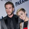 Liam Hemsworth et Miley Cyrus à la première de 'Paranoia' à Los Angeles, le 8 août 2013.
