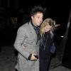Un couple in love ! Kate Moss et son mari Jamie Hince quittent une soirée à Londres le 12 février 2014.