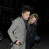Kate Moss et son mari Jamie Hince quittent une soirée à Londres le 12 février 2014.