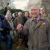 Le prince Charles en visite aux habitants de Muchelney, victimes d'inondations, dans le Somerset, le 4 février 2014.