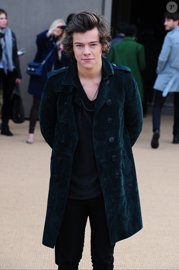 Harry Styles arrive au défilé Burberry Prorsum automne/hiver 2014 à Londres le 17 février 2014
