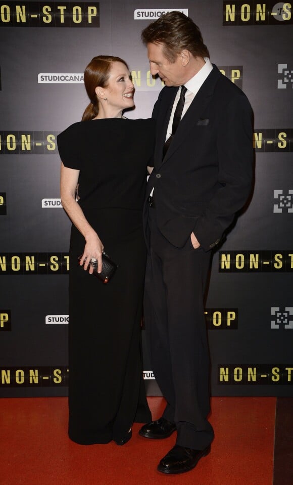 Julianne Moore et Liam Neeson lors de l'avant-première du film " Non-Stop " au cinéma Gaumont Capucines à Paris le 27 janvier 2014