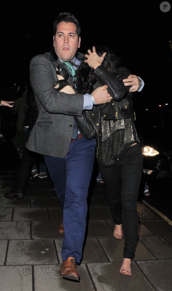 Michelle Rodriguez quitte le club Ronnie Scott, où elle a assisté à un concert privé de Prince. Londres, le 17 février 2014.