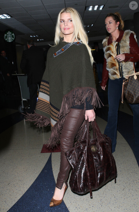 Jessica Simpson arrive à l'aéroport LAX de Los Angeles, en provenance de New York. Le 31 janvier 2014.