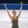 Adelina Sotnikova, heureuse et soulagée après être devenue la première championne olympique de patinage artistique lors des Jeux olympiques de Sotchi le 20 février 2014 à l'Iceberg Skating Palace de Sotchi