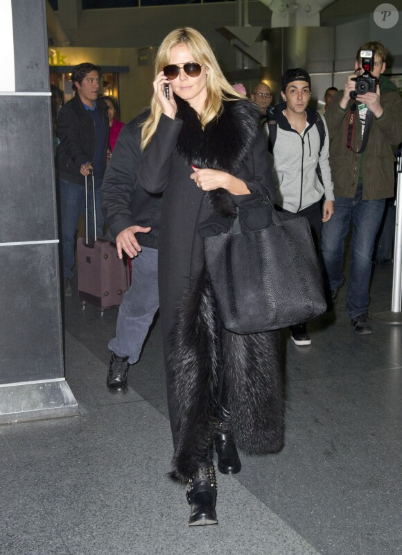 Heidi Klum arrives at JFK airport in New York City, NY, USA on February 23, 2014. Photo by XPosure/ABACAPRESS.COM24/02/2014 -