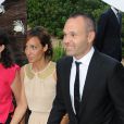 Le footballeur Andrés Iniesta et sa femme Anna Ortiz au mariage de Xavi à Blanes, le 13 juillet 2013.