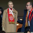  La princesse Charlene et le prince Albert II de Monaco lors du choc ASM - PSG au Stade Louis II le 9 février 2014 