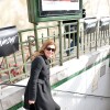 Valérie Trierweiler s'engouffre dans le métro parisien à la sortie du défilé de mode "Christian Dior" qui se déroulait au musée Rodin à Paris, le 28 février 2014