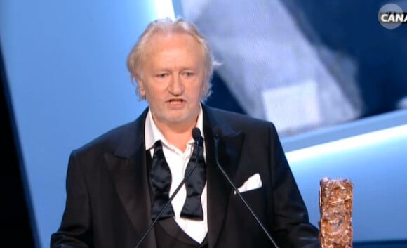 Niels Arestrup lauréat du César du meilleur second rôle dans Quai d'Orsay de Bertrand Tavernier, le 28 février 2014 à Paris