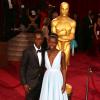Lupita Nyong'o et son frère Peter, lors de la 86e cérémonie des Oscars à Hollywood, le 2 mars 2014