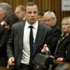 Oscar Pistorius au premier jour de son procès pour le meurtre de Reeva Steenkamp devant la haute Cour de Pretoria, le 3 mars 2014