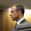 Oscar Pistorius au premier jour de son procès pour le meurtre de Reeva Steenkamp devant la haute Cour de Pretoria, le 3 mars 2014