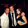 Cyril Peret (propriétaire du bar) avec Quentin Tarantino et sa compagne Courtney lors de la soirée au Titty Twister après la cérémonie des César, à Paris le 28 février 2014