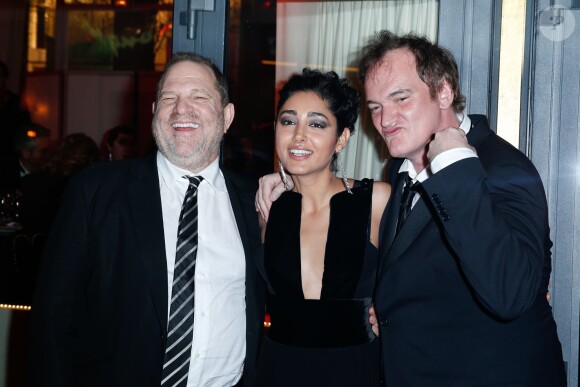 Golshifteh Farahani (bijoux Cartier) entre Harvey Weinstein et Quentin Tarantino lors du dîner au Fouquet's post-39e cérémonie des César à Paris, le 28 février 2014