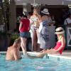 Exclusif - Kelsey Grammer et sa femme Kayte Walsh avec leur fille Faith dans la piscine du Beverly Hills Hotel, le 20 janvier 2014.