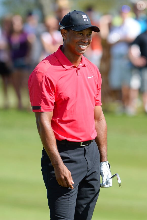 Tiger Woods avait le sourire avant d'abandonner lors du dernier tour du tournoi Honda Classic au PGA National Resort and Spa dePalm Beach Gardens, le 2 mars 2014