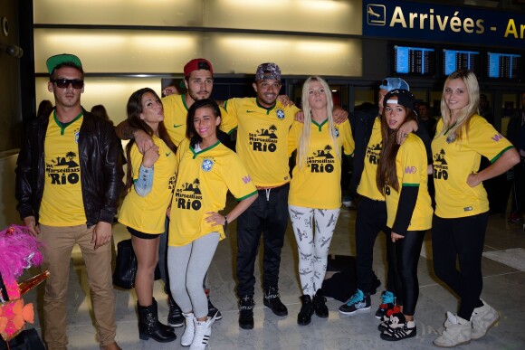 Micha, Kim, Kelly, Romain, Julien, Jessica, Paga, Stephanie et Charlotte de retour à Paris après le tournage de l'émission 'Les Marseillais a Rio' pour W9, le 6 mars 2014, à l'aéroport Roissy Charles de Gaulle.