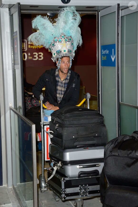 Paga de retour à Paris après le tournage de l'émission 'Les Marseillais a Rio' pour W9, le 6 mars 2014, à l'aéroport Roissy Charles de Gaulle.