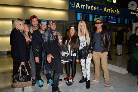 Charlotte, Kim, Romain, Paga, Julien,Stephanie, Jessica et Micha de retour à Paris après le tournage de l'émission 'Les Marseillais a Rio' pour W9, le 6 mars 2014, à l'aéroport Roissy Charles de Gaulle.