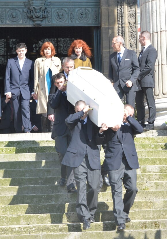Camille Bordes-Resnais (fille d'Alain Resnais), Sabine Azéma lors des funérailles d'Alain Resnais en l'église Saint-Vincent-de-Paul à Paris le 10 mars 2014