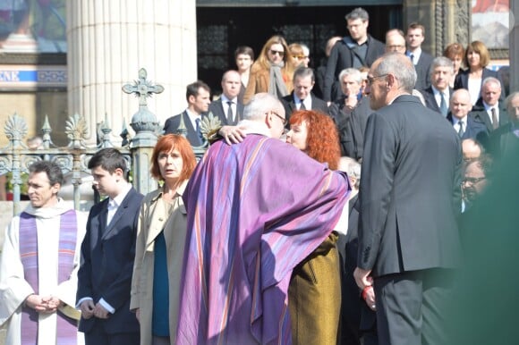 Sabine Azéma, Camille Bordes-Resnais (fille d'Alain Resnais) lors des funérailles d'Alain Resnais en l'église Saint-Vincent-de-Paul à Paris le 10 mars 2014